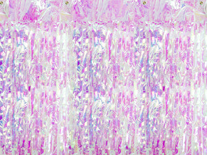Iridescent fringe curtain backdrop available at A Little Confetti