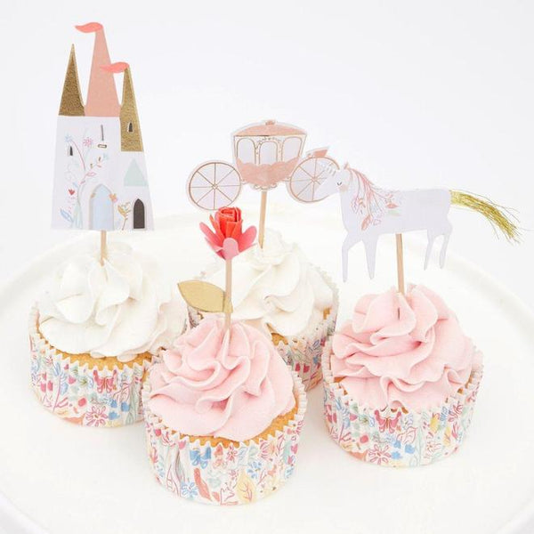 Meri Meri's Princess Cupcake kit. With carriage, castle, unicorn and floral cupcake toppers. Floral Baking cups included. Available at A Little Confetti.