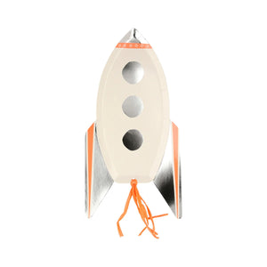 White and silver rocket plates with an orange tassel sold at ALittleConfetti, by Meri Meri